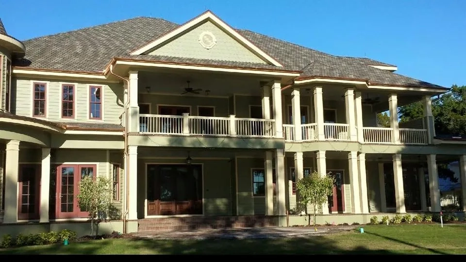 Precision Gutters FL providing custom copper gutter installation for a high-end residential property in Florida.