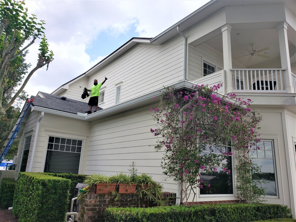 Two-story Florida home with professionally maintained and repaired residential gutter system