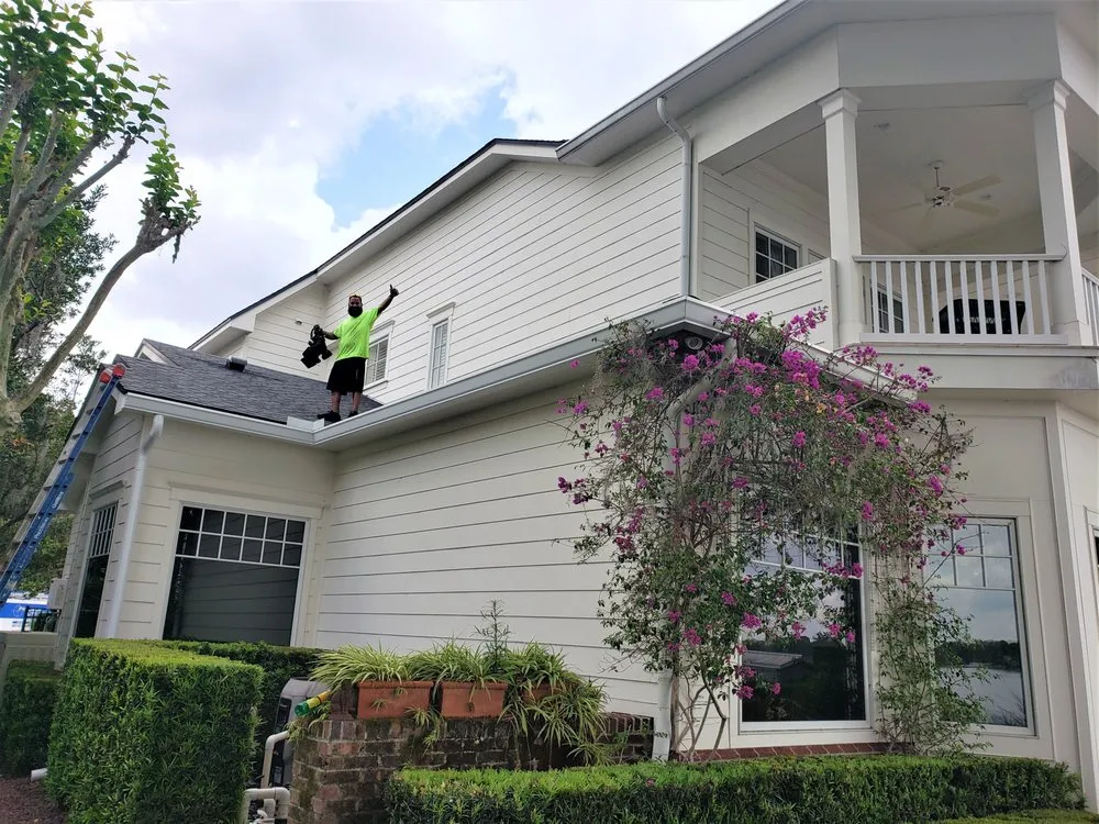 Two-story Florida home with professionally maintained and repaired residential gutter system